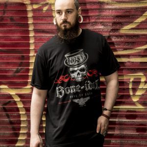 Man wearing black Bone Idol skull t-shirt by Haus of Goth, urban setting