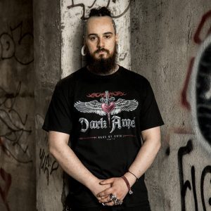 Man wearing black Dark Angel by SPQR t-shirt with winged design