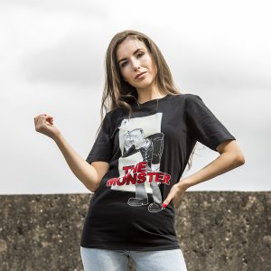 Woman wearing Fifi Lloyd The Monster t-shirt with character illustration