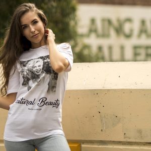 Woman wearing Marilyn Monroe Natural Beauty t-shirt outside gallery building