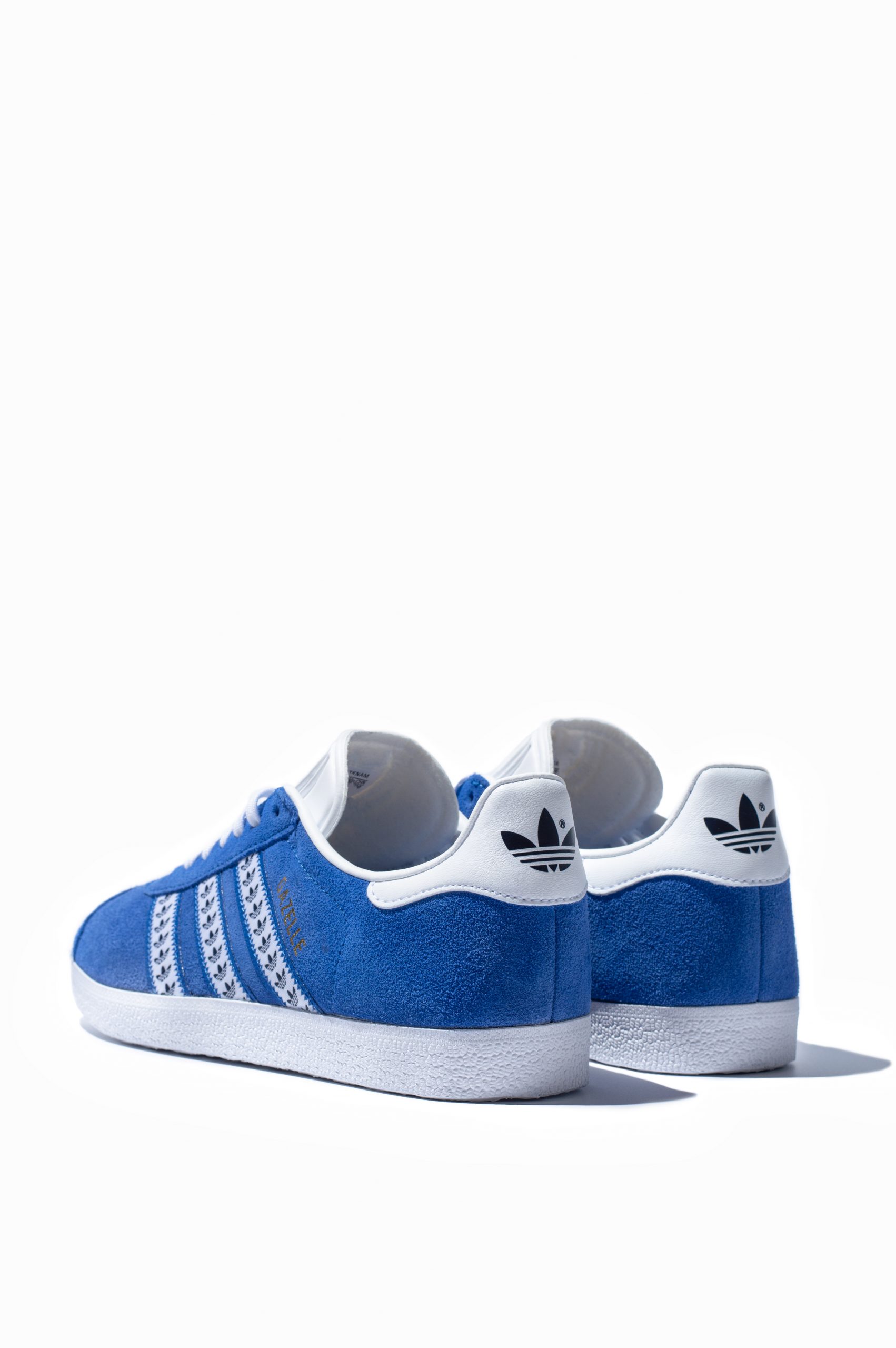 Adidas Gazelle blue suede trainers from behind showing heel detail