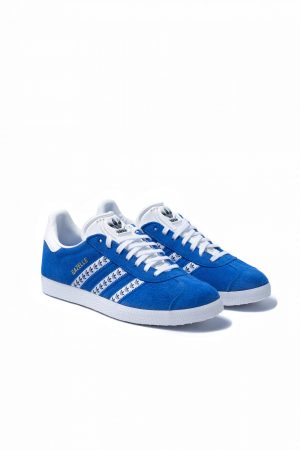 Pair of Adidas Gazelle trainers in blue suede with white stripes, front view