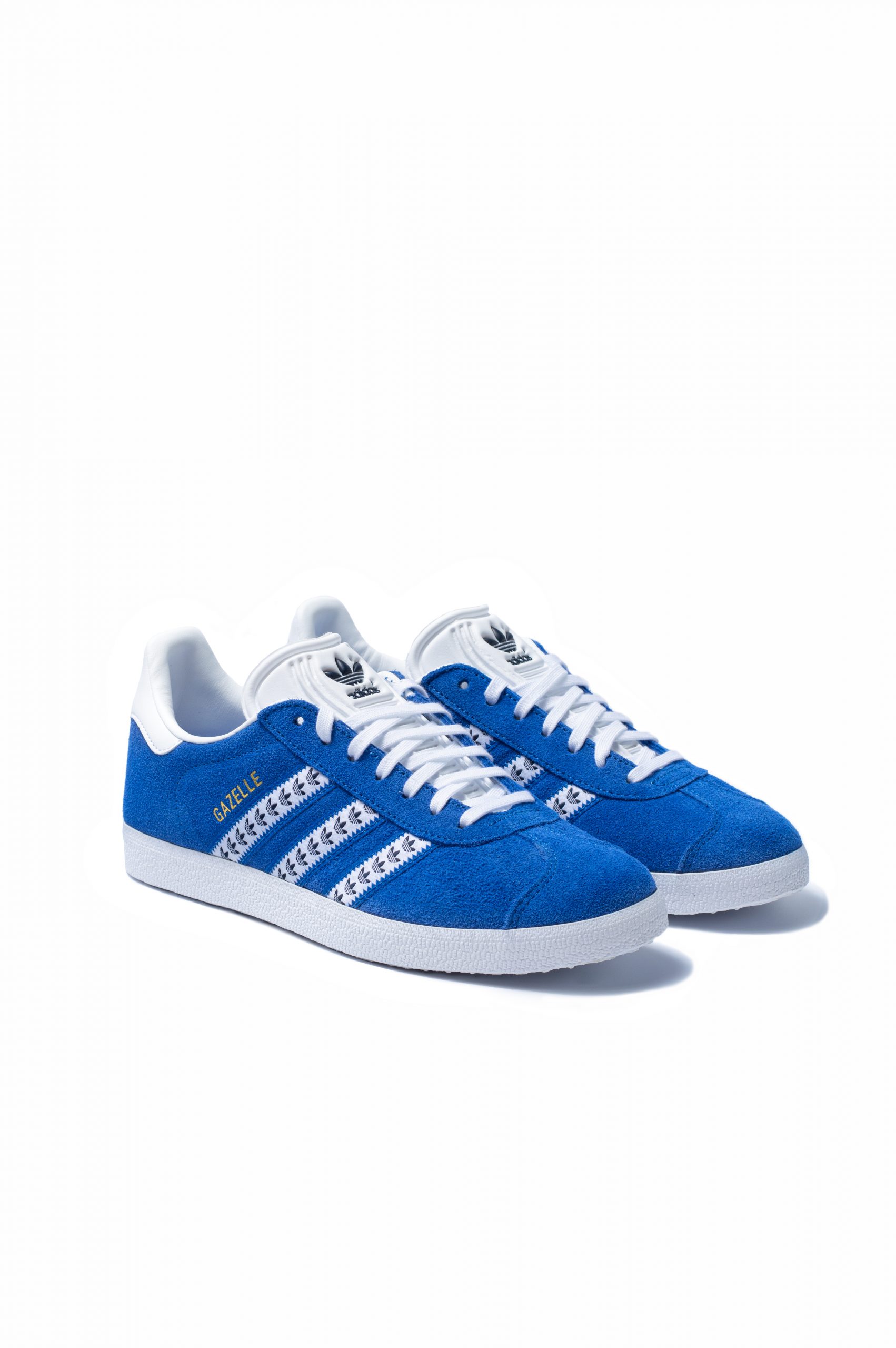 Pair of Adidas Gazelle trainers in blue suede with white stripes, front view