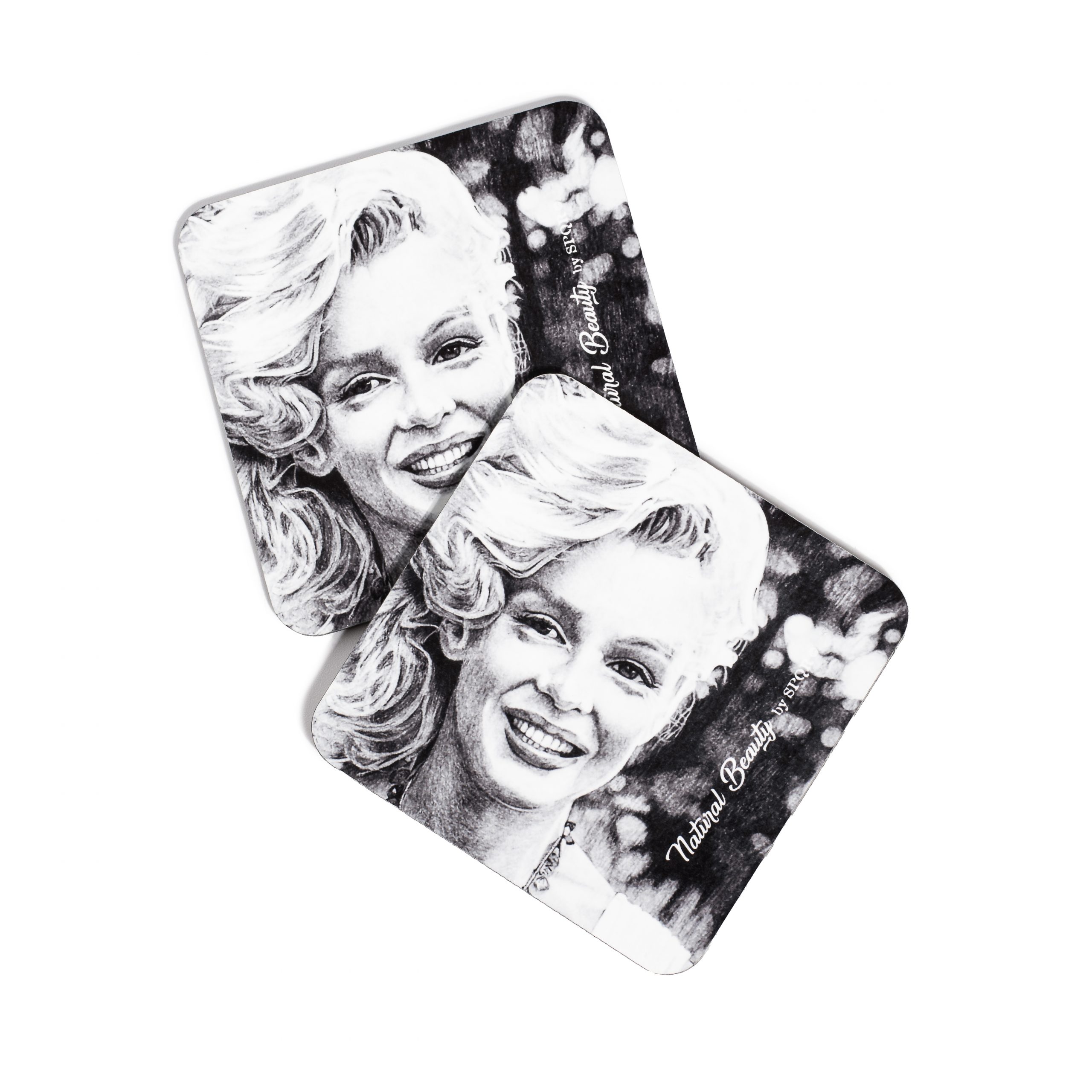 Two Marilyn Monroe Natural Beauty coasters with black and white portrait