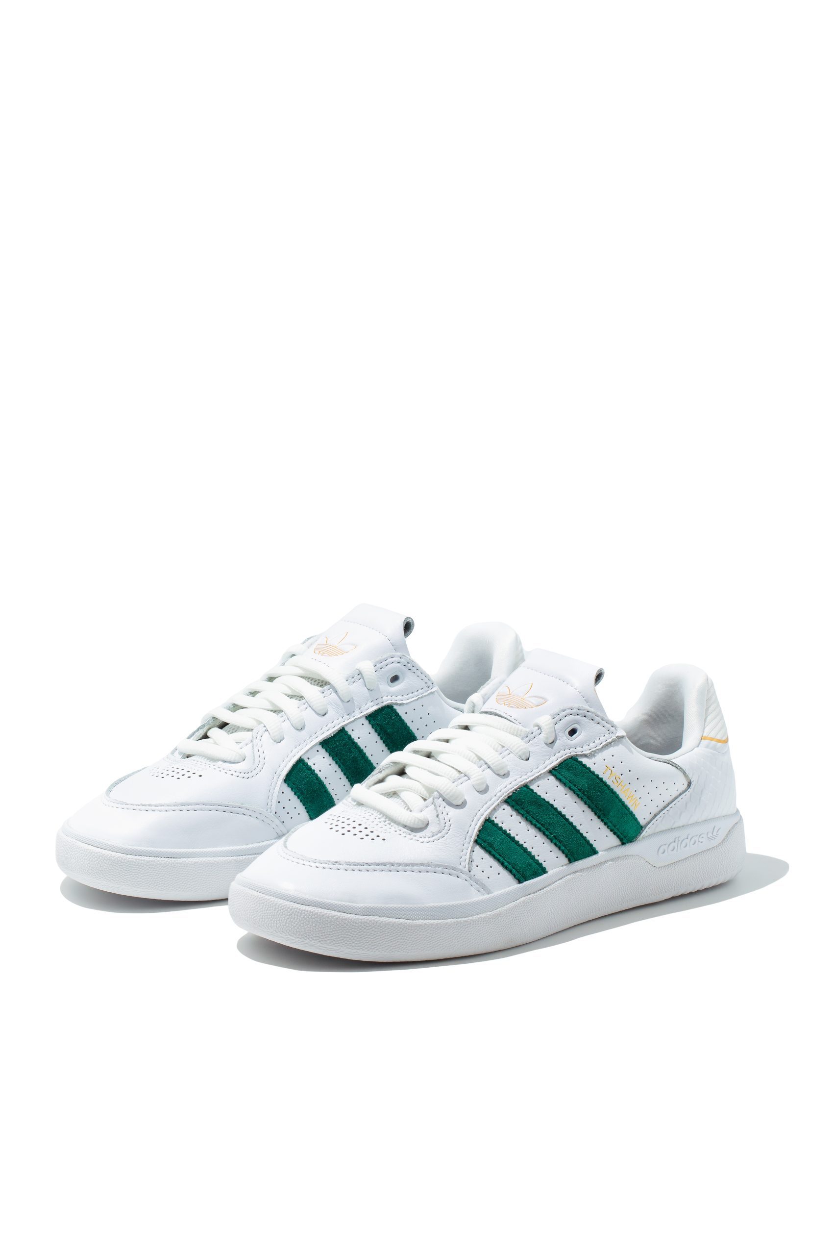 Pair of Adidas Stan Smith trainers in white leather with green stripes