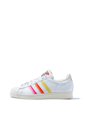 Adidas Superstar trainers in white with rainbow Pride detailing on three stripes